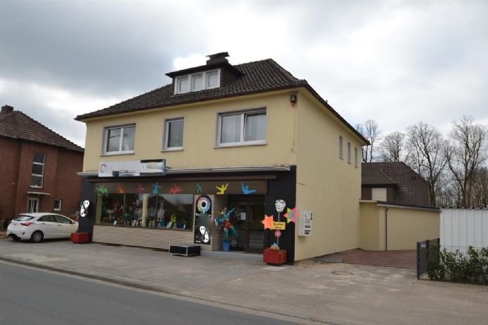 Zentral gelegenes Wohn- Geschäftshaus auf einem Eigentumsgrundstück in